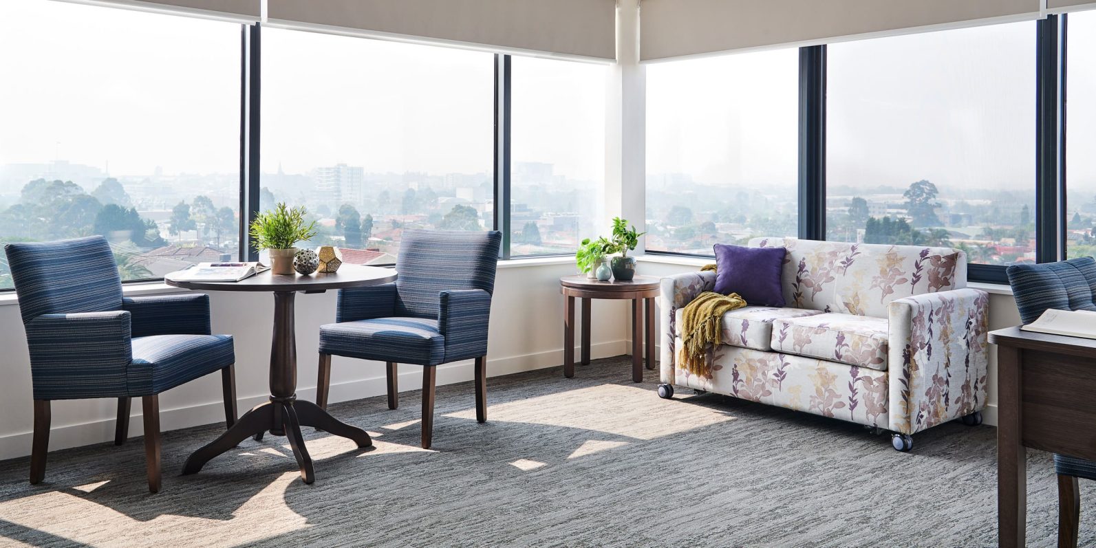 Preston Community Premium Suite lounge room.