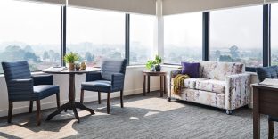 Preston Community Premium Suite lounge room.