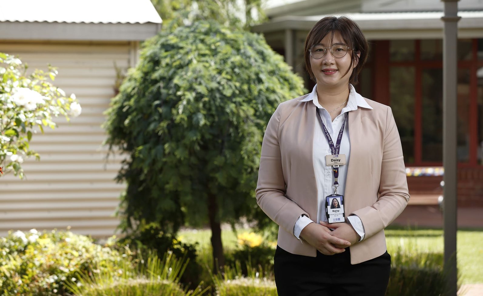 Portrait of person in garden.