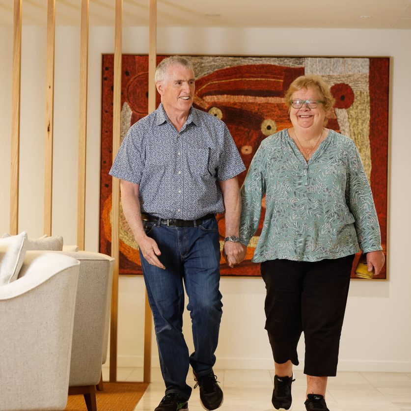 Couple pictured walking in foyer